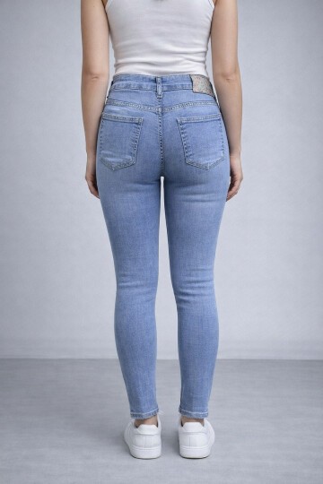 Açık Mavi Paçaları Püsküllü Jean
