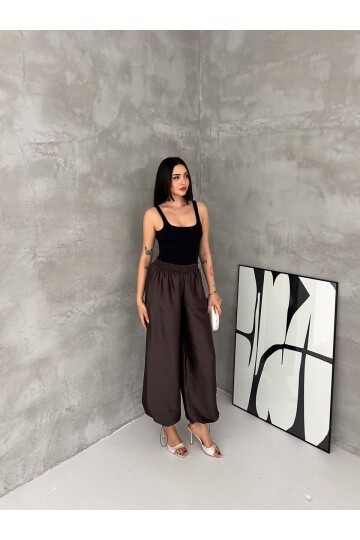 Saten Dokulu Lastik Paça Detaylı Yüksek Bel Bol Pantolon